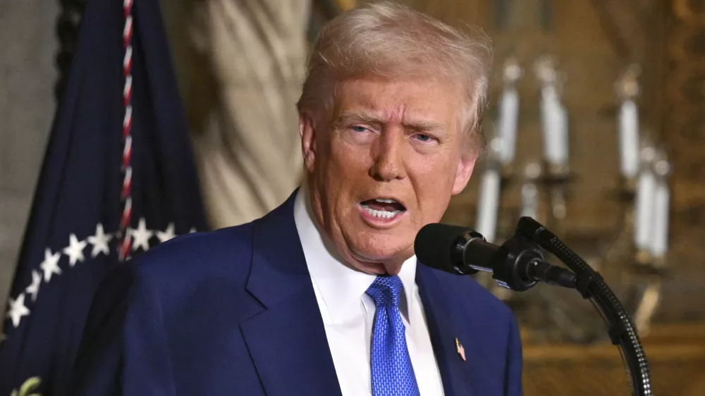 President Donald Trump speaks at Mar-a-Lago in Palm Beach, Fla., Tuesday, Feb. 18, 2025. (Pool via AP)