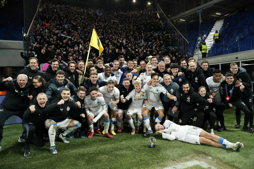 Soccer Football - Champions League - Knockout Phase Playoff - Second Leg - Atalanta v Club Brugge - Gewiss Stadium, Bergamo, Italy - February 18, 2025 Club Brugge players celebrate after the match REUTERS/Alessandro Garofalo