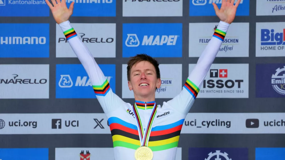 Cycling - UCI World Championships 2024 - Men's Elite Road Race - Zurich, Switzerland - September 29, 2024 Gold medallist Slovenia's Tadej Pogacar celebrates on the podium REUTERS/Denis Balibouse