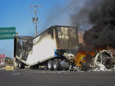 FILE - A truck burns on a street in Culiacan, Sinaloa state, Mexico, Jan. 5, 2023, after Mexican security forces captured Ovidio Guzmán, a son of former Sinaloa cartel boss Joaquín "El Chapo" Guzmán, which set off gunfights and roadblocks. (AP Photo/Martin Urista, File)