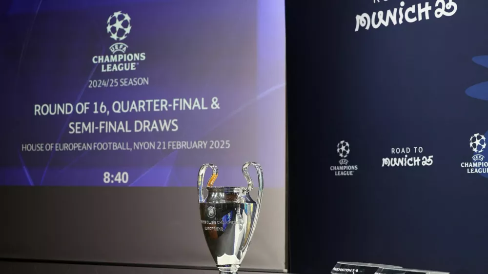 Soccer Football - Champions League - Round of 16, Quarter-Final, Semi-Final and Final draws - UEFA Headquarters, Nyon, Switzerland - February 21, 2025 The Champions League trophy is displayed before the start of the draw REUTERS/Pierre Albouy