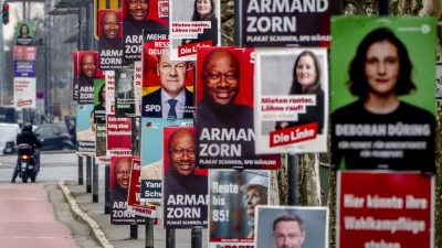 Election posters of various parties are fixed at lamp poles in central Frankfurt, Germany, Thursday, Feb. 20, 2025. (AP Photo/Michael Probst)