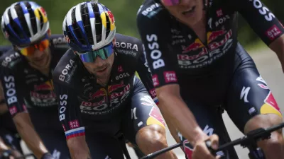 Slovenia's Primoz Roglic rides during the fourth stage of the Tour de France cycling race over 139.6 kilometers (86.7 miles) with start in Pinerolo, Italy and finish in Valloire, France, Tuesday, July 2, 2024. (AP Photo/Daniel Cole)