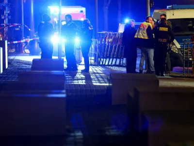 Security personnel gather after a suspected knife attack at the Holocaust Memorial, according to local media, in Berlin, Germany, February 21, 2025. REUTERS/Fabrizio Bensch   TPX IMAGES OF THE DAY