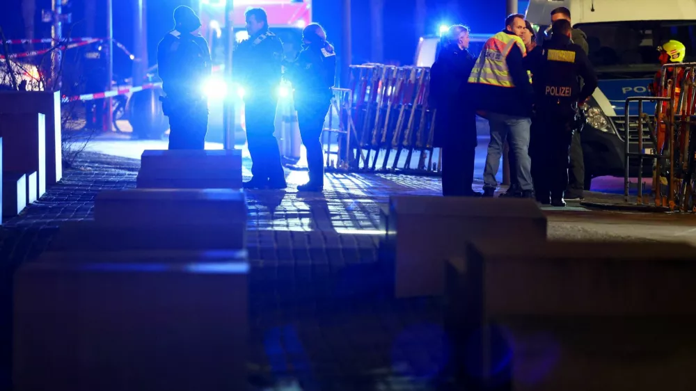 Security personnel gather after a suspected knife attack at the Holocaust Memorial, according to local media, in Berlin, Germany, February 21, 2025. REUTERS/Fabrizio Bensch   TPX IMAGES OF THE DAY