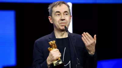 Dag Johan Haugerud holds the Golden Bear for Best Film for "Dreams (Sex Love)" as he speaks during the awards ceremony at the 75th Berlinale International Film Festival in Berlin, Germany, February 22, 2025. REUTERS/Fabrizio Bensch