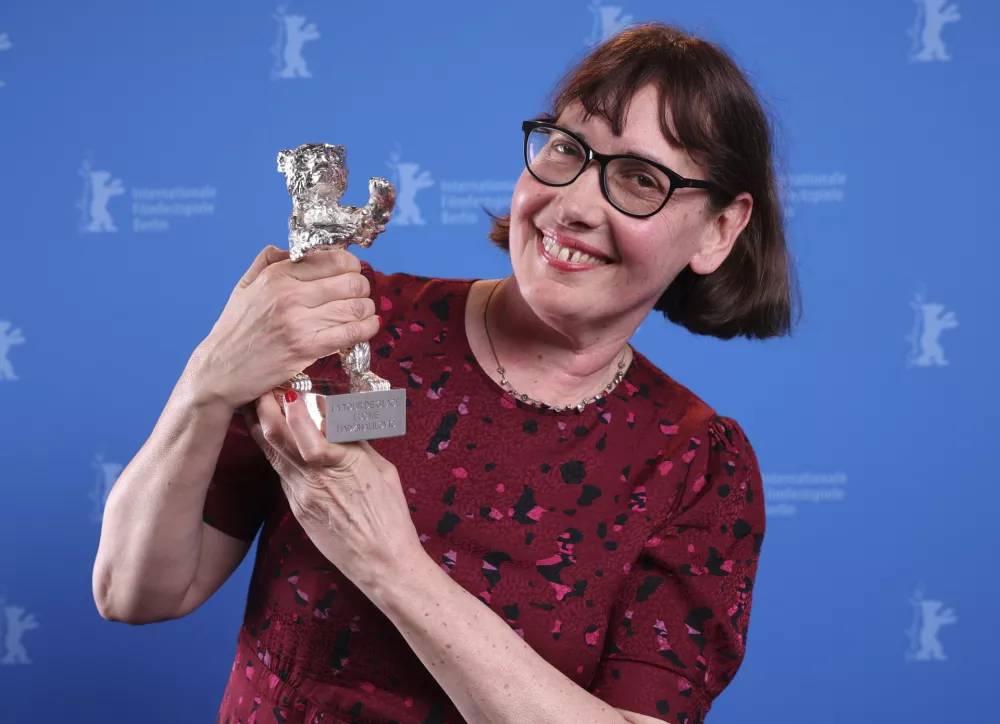 French director Lucile Hadzihalilovic poses with the Silver Bear for Outstanding Artistic Contribution for the creative ensemble during the winner's photocall at the International Film Festival, Berlinale, in Berlin, Saturday, Feb. 22, 2025. (Ronny Hartmann/Pool via AP)