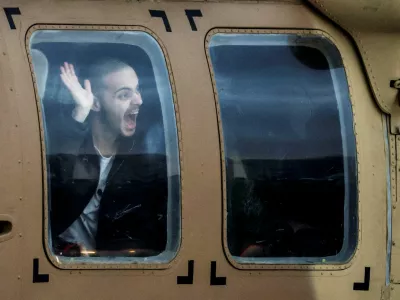 Omer Wenkert, a hostage who was held in Gaza since the deadly October 7, 2023 attack, sits inside a helicopter after he was released from captivity as part of a hostages-prisoners swap and a ceasefire deal between Hamas and Israel, at Beilinson Schneider complex in Petah Tikva, Israel, February 22, 2025. REUTERS/Nir Elias REFILE - QUALITY REPEAT