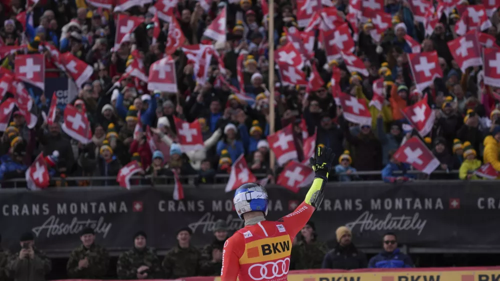 Switzerland's Marco Odermatt reacts after completing an alpine ski, men's World Cup super G, in Crans Montana, Switzerland, Sunday, Feb. 23, 2025. (AP Photo/Giovanni Auletta)