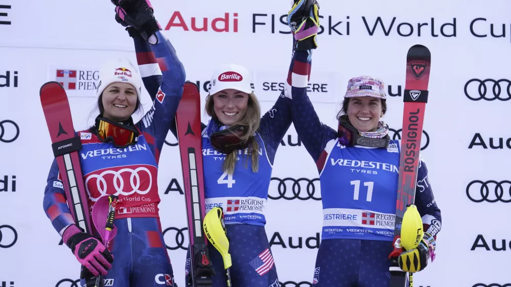 From left, second placed Croatia's Zrinka Ljutic, the winner United States' Mikaela Shiffrin and third placed United States' Paula Moltzan celebrate after an alpine ski, women's World Cup slalom, in Sestriere, Italy, Sunday, Feb. 23, 2025. (AP Photo/Piermarco Tacca)