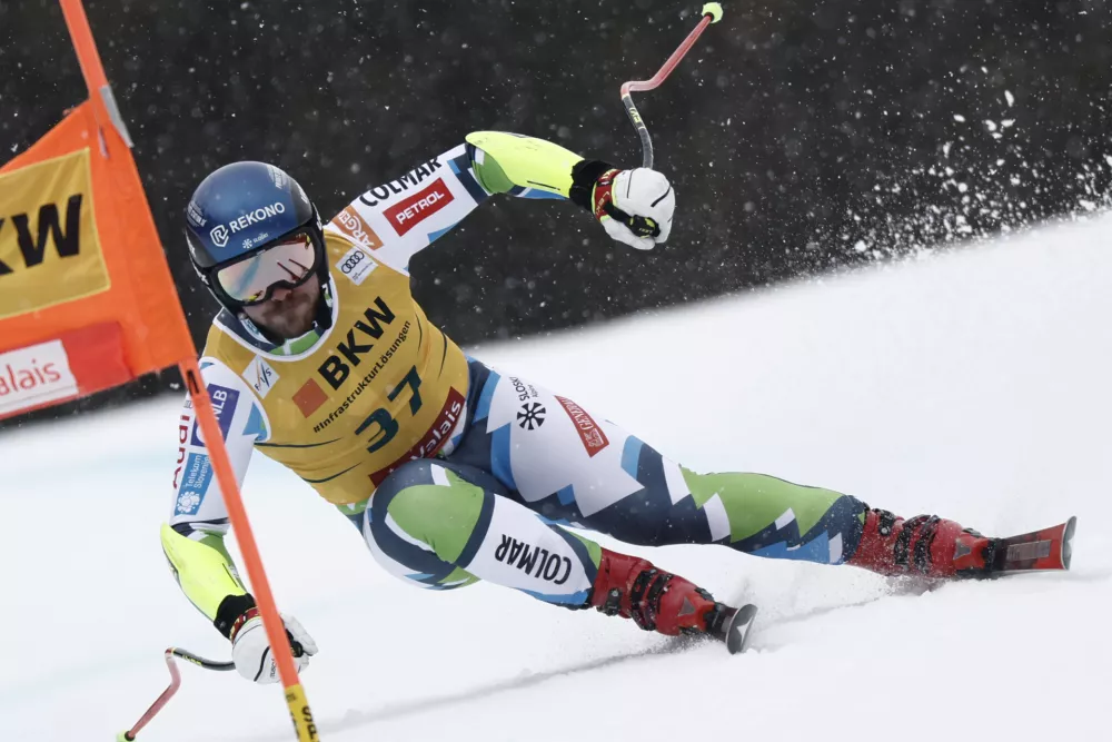 Slovenia's Miha Hrobat speeds down the course during an alpine ski, men's World Cup super G, in Crans Montana, Switzerland, Sunday, Feb. 23 2025. (AP Photo/Gabriele Facciotti)