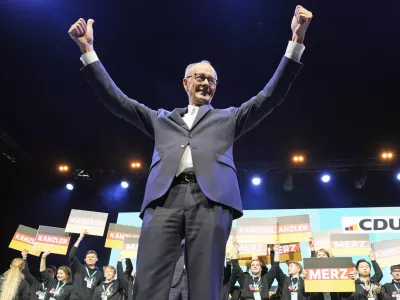 CDU top candidate for chancellor Friedrich Merz cheers to supporters at the main election campaign event of the Christian Democratic Union, Friday, Feb. 21, 2025, in Oberhausen, Germany, ahead of Sunday's German federal Bundestag elections. (AP Photo/Martin Meissner)