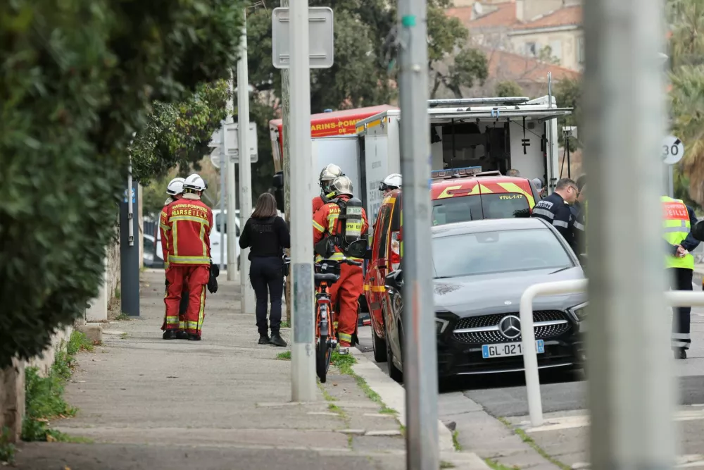 French firefighters and rescue forces work near the entrance of the Russian consulate in Marseille after the consul general confirmed there had been an explosion, in Marseille, France, February 25, 2025. REUTERS/Stringer