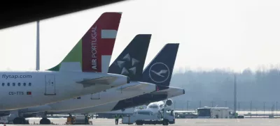 Airplanes are seen on the tarmac the day before VERDI union called airport workers at Frankfurt, Munich, Stuttgart, Hamburg, Dortmund, Hanover and Bremen airports to go on a 24-hour strike on Friday, at the Munich International Airport, Germany, February 16, 2023. REUTERS/Leonhard Simon