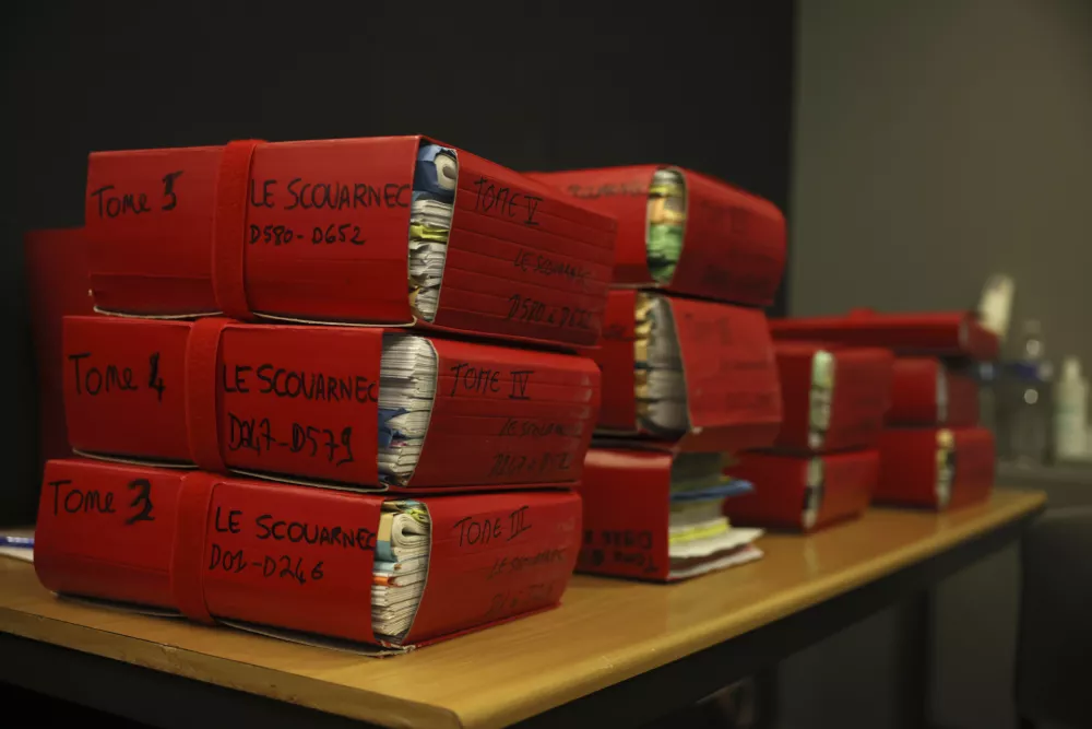 Files are pictured in the Vannes courthouse, western France, on the opening day of the trial of French surgeon Joel Le Scouarnec accused of raping or abusing 299 people, mostly child patients, Monday, Feb. 24, 2025. (AP Photo/Thomas Padilla)