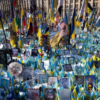 Tributes are placed during the memorial for the fallen at Independence Square Maidan on the third anniversary of Russia's invasion of Ukraine, in Kyiv, Ukraine February 24, 2025. Ritzau Scanpix/Bo Amstrup/via REUTERS  ATTENTION EDITORS - THIS IMAGE WAS PROVIDED BY A THIRD PARTY. DENMARK OUT. NO COMMERCIAL OR EDITORIAL SALES IN DENMARK.