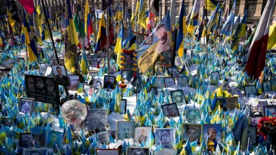 Tributes are placed during the memorial for the fallen at Independence Square Maidan on the third anniversary of Russia's invasion of Ukraine, in Kyiv, Ukraine February 24, 2025. Ritzau Scanpix/Bo Amstrup/via REUTERS  ATTENTION EDITORS - THIS IMAGE WAS PROVIDED BY A THIRD PARTY. DENMARK OUT. NO COMMERCIAL OR EDITORIAL SALES IN DENMARK.