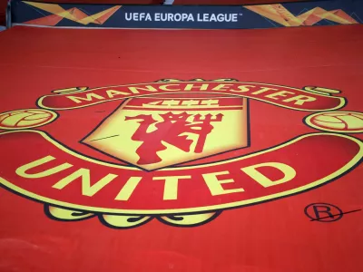 FILE PHOTO: Soccer Football - Europa League - Round of 16 First Leg - Manchester United v AC Milan - Old Trafford, Manchester, Britain - March 11, 2021 General view of the crest of Manchester United inside the stadium before the match REUTERS/Phil Noble/File Photo