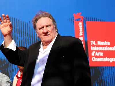 FILE PHOTO: Gerard Depardieu waves as he arrives during a red carpet event for the movie "Novecento- Atto Primo" at the 74th Venice Film Festival in Venice, Italy, Italy September 5, 2017.  REUTERS/Alessandro Bianchi/File Photo