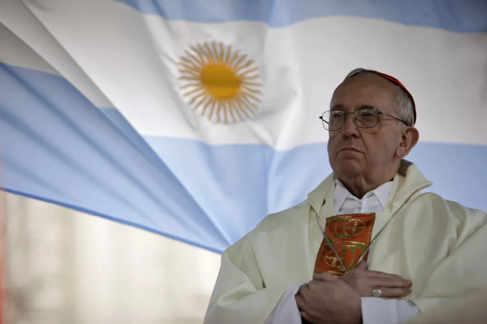 ﻿FILE - This Aug. 7, 2009 file photo shows Argentina's Cardinal Jorge Bergoglio giving a mass outside the San Cayetano church in Buenos Aires. Bergoglio, who took the name of Pope Francis, was elected on Wednesday, March 13, 2013 the 266th pontiff of the Roman Catholic Church. (AP Photo/Natacha Pisarenko, files)