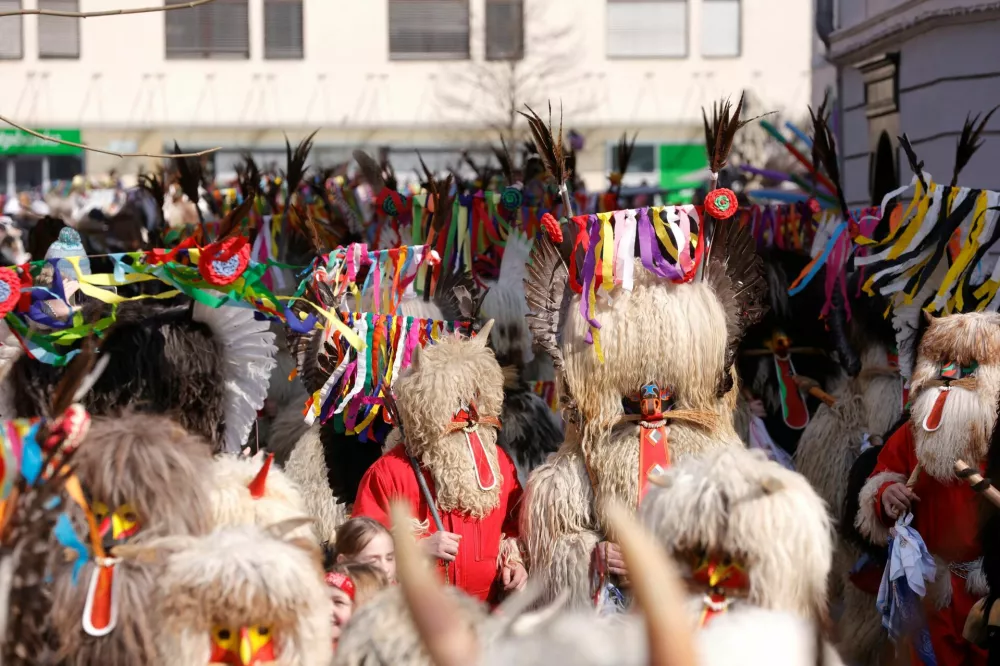 Participants dressed in costumes perform at the traditional festival Kurentovanje in Ptuj, Slovenia, February 22, 2025. REUTERS/Borut Zivulovic