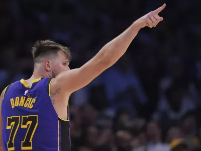 Los Angeles Lakers guard Luka Doncic reacts during the second half of an NBA basketball game against the Dallas Mavericks, Tuesday, Feb. 25, 2025, in Los Angeles. (AP Photo/Mark J. Terrill)