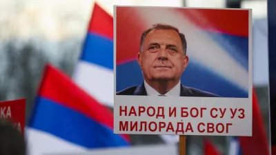 A sign is displayed as Bosnian Serbs rally in front of the regional parliament in support of President of Republika Srpska (Serb Republic) Milorad Dodik, a day ahead of his court verdict on charges that he defied rulings by an international peace envoy, in Banja Luka, Bosnia and Herzegovina, February 25, 2025. REUTERS/Amel Emric