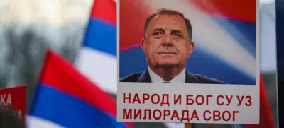 A sign is displayed as Bosnian Serbs rally in front of the regional parliament in support of President of Republika Srpska (Serb Republic) Milorad Dodik, a day ahead of his court verdict on charges that he defied rulings by an international peace envoy, in Banja Luka, Bosnia and Herzegovina, February 25, 2025. REUTERS/Amel Emric