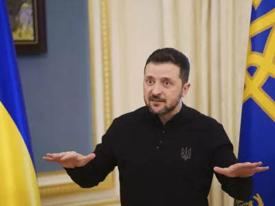 Ukrainian President Volodymyr Zelenskyy speaks to journalists during press conference in Kyiv, Ukraine, Wednesday, Feb. 26, 2025. (AP Photo/Evgeniy Maloletka)