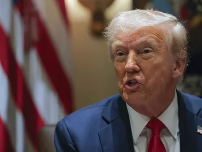 President Donald Trump speaks during a Cabinet meeting at the White House in Washington, Tuesday, Feb. 26, 2025. (Pool via AP)