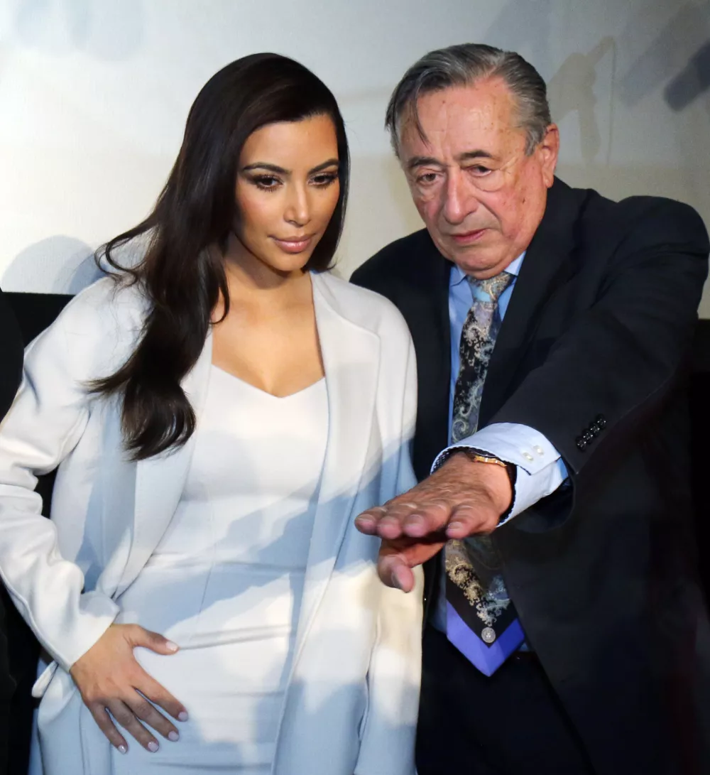 ﻿Television personality Kim Kardashian and Austrian businessman Richard Lugner, from left, arrive for a news conference in Vienna, Austria, Thursday, Feb. 27, 2014. Kardashian will be Lugner's special guest at this year's Opera Ball. (AP Photo/Ronald Zak)