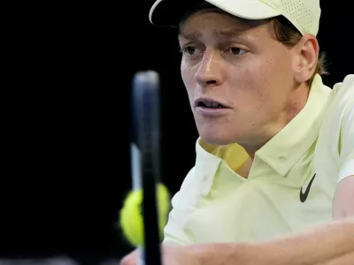 FILE -Jannik Sinner of Italy plays a backhand return to Alexander Zverev of Germany during the men's singles final at the Australian Open tennis championship in Melbourne, Australia, Jan. 26, 2025. (AP Photo/Asanka Brendon Ratnayake, File)