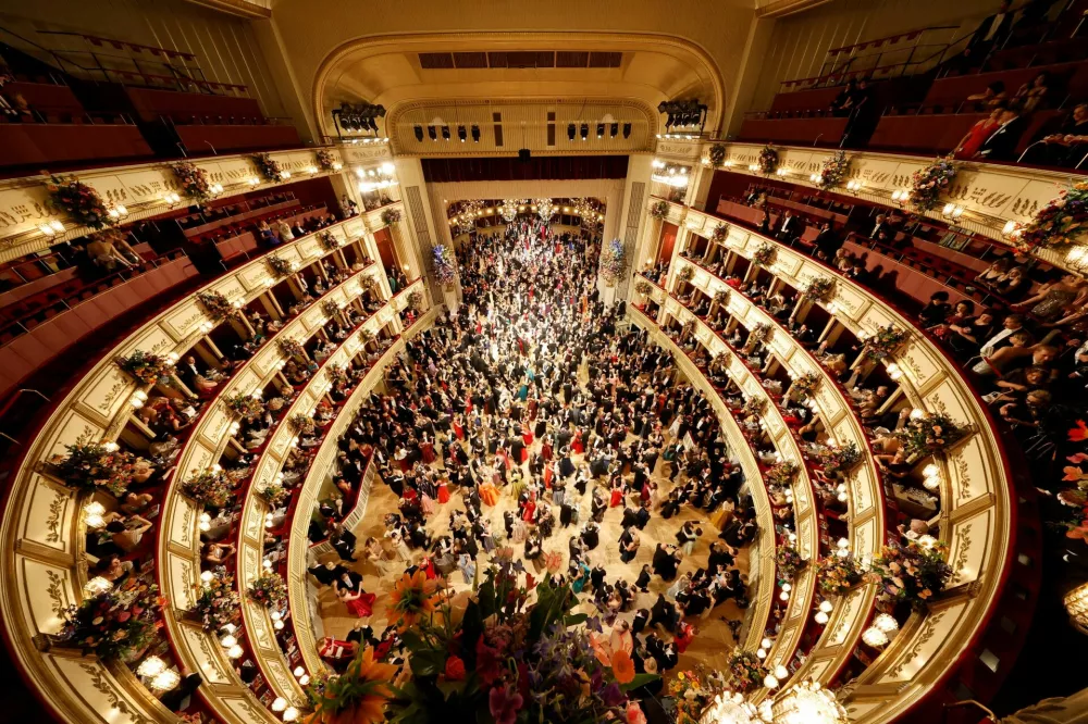 People dance during the opening ceremony of the traditional Opera Ball in Vienna, Austria, February 27, 2025. REUTERS/Lisa Leutner