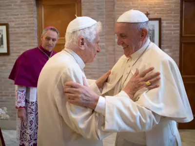 FILE - Pope Francis, right, hugs Pope Emeritus Benedict XVI in the former Convent Mater Ecclesiae at the Vatican, on Nov. 19, 2016. Pope Benedict XVI's 2013 resignation sparked calls for rules and regulations for future retired popes to avoid the kind of confusion that ensued. Benedict, the German theologian who will be remembered as the first pope in 600 years to resign, has died, the Vatican announced Saturday Dec. 31, 2022. He was 95. (L'Osservatore Romano/Pool Photo via AP, File)