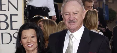 FILE - Actor Gene Hackman arrives with his wife, Betsy Arakawa, for the 60th Annual Golden Globe Awards in Beverly Hills, Calif., Sunday, Jan. 19, 2003. (AP Photo/Mark J. Terrill, File)