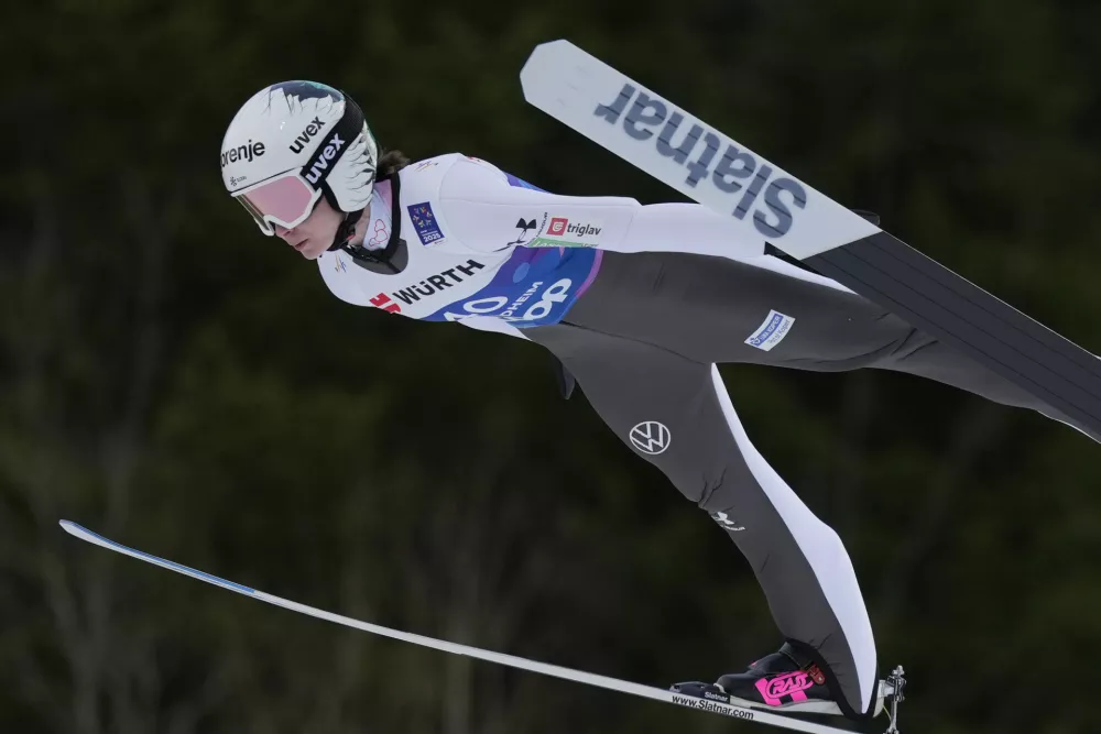 Nika Prevc of Slovenia competes at the Women Normal Hill HS102 Individual Ski Jumping event at the Nordic World Ski Championships, in Trondheim, Norway, Friday, Feb. 28, 2025. (AP Photo/Matthias Schrader)