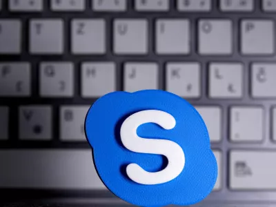 FILE PHOTO: A 3D printed Skype logo is placed in front of a keyboard in this illustration taken April 12, 2020. REUTERS/Dado Ruvic/Illustration/File Photo