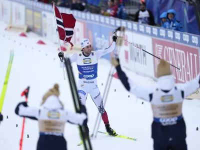 Jarl Magnus Riiber of Norway celebrates victory of his team in the Nordic Combined Mixed Team Normal Hill HS102/4x5km Cross-Country competition at the Nordic World Ski Championships in Trondheim, Norway, Friday, Feb. 28, 2025. (AP Photo/Matthias Schrader)