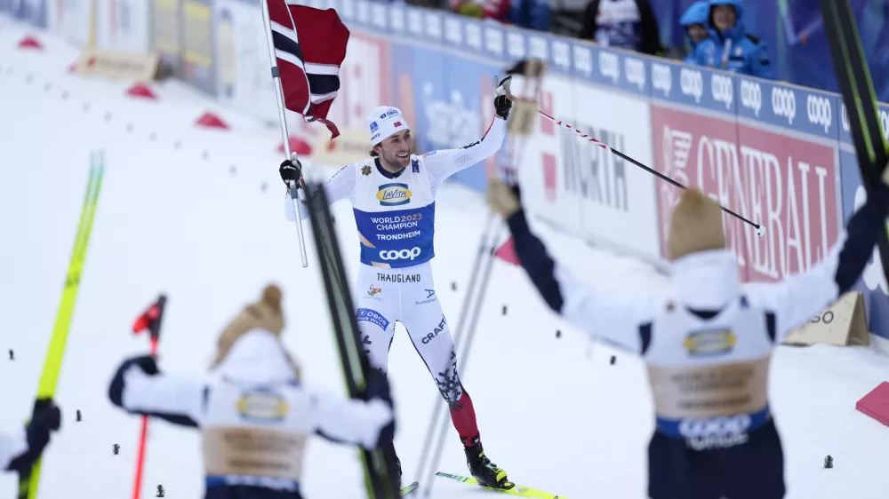 Jarl Magnus Riiber of Norway celebrates victory of his team in the Nordic Combined Mixed Team Normal Hill HS102/4x5km Cross-Country competition at the Nordic World Ski Championships in Trondheim, Norway, Friday, Feb. 28, 2025. (AP Photo/Matthias Schrader)