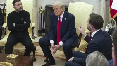 Vice President JD Vance, right, speaks with Ukrainian President Volodymyr Zelenskyy, left, as President Donald Trump listens in the Oval Office at the White House, Friday, Feb. 28, 2025, in Washington. (AP Photo/ Mystyslav Chernov)