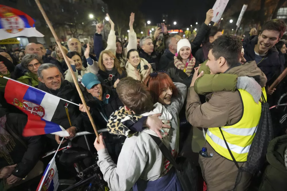 People welcome students who have arrived to protest the deaths of 15 people killed in the November collapse of a train station canopy in the town of Nis, Serbia, Friday, Feb. 28, 2025. (AP Photo/Darko Vojinovic)