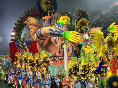 01 March 2025, Brazil, Rio De Janeiro: The "Estacio de Sa" samba school parades through the Sambodrome during the Carnival in Rio de Janeiro. In Rio de Janeiro, the world-famous parades in the Sambodrome have begun with the samba schools of the promotion class. Photo: Phillipp Znidar/dpa