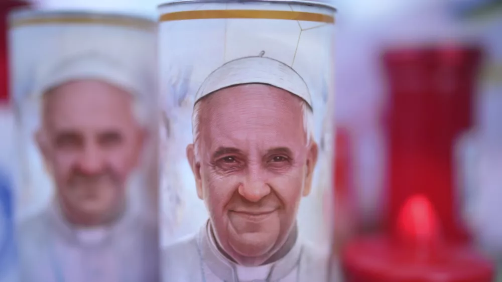 Candles for Pope Francis are seen at the Agostino Gemelli Polyclinic, in Rome, Friday, Feb. 28, 2025 where Pope Francis has been hospitalized since Friday, Feb. 14. (AP Photo/Alessandra Tarantino)