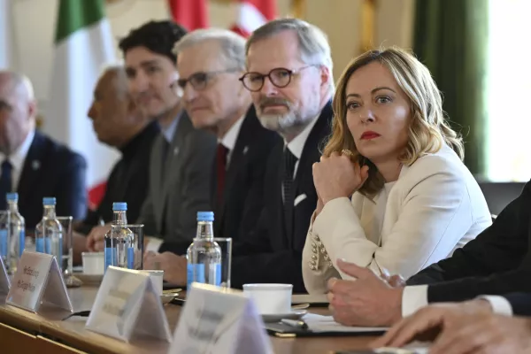 Italy's Prime Minister Giorgia Meloni, right, at the European leaders' summit to discuss Ukraine, hosted by Britain's Prime Minister Keir Starmer, at Lancaster House, London, Sunday March 2, 2025. (Justin Tallis/Pool via AP)