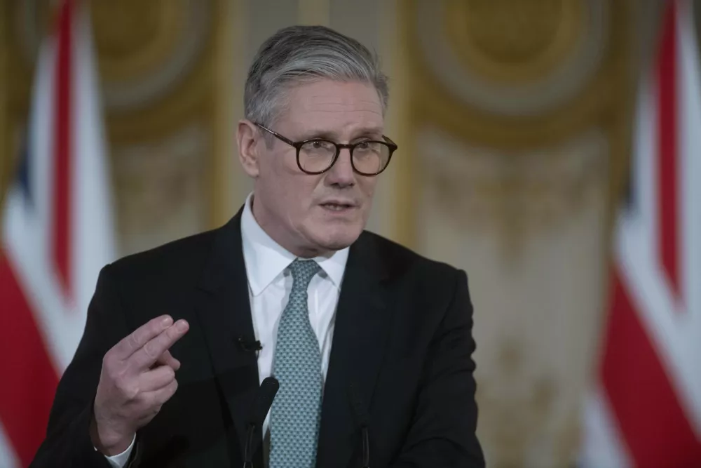 Britain's Keir Starmer speaks at a press conference as he hosts a European leaders' summit to discuss Ukraine, at Lancaster House in London, Sunday March 2, 2025. (Julian Simmonds/Pool via AP)