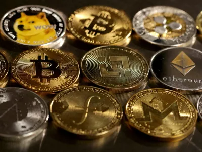 FILE PHOTO: Representations of cryptocurrencies are seen in this illustration, August 10, 2022. REUTERS/Dado Ruvic/Illustration/File Photo
