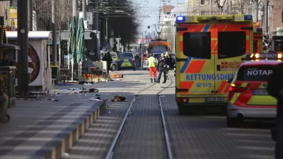 Emergency services and police stand at Paradeplatz in Mannheim, Germany, after a serious incident, Monday March 3, 2025. (Dieter Leder/dpa via AP)