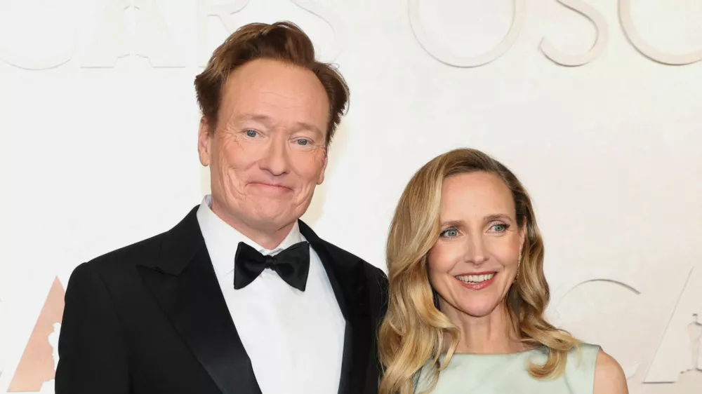 Conan O'Brien and Liza Powel O'Brien pose during the Oscars arrivals at the 97th Academy Awards in Hollywood, Los Angeles, California, U.S., March 2, 2025. REUTERS/Mario Anzuoni