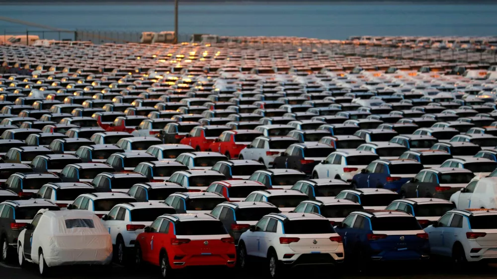 FILE PHOTO: Cars produced at Autoeuropa factory are seen parked at the Setubal harbor waiting to be shipped, in Setubal, Portugal November 23, 2018. REUTERS/Rafael Marchante/File Photo