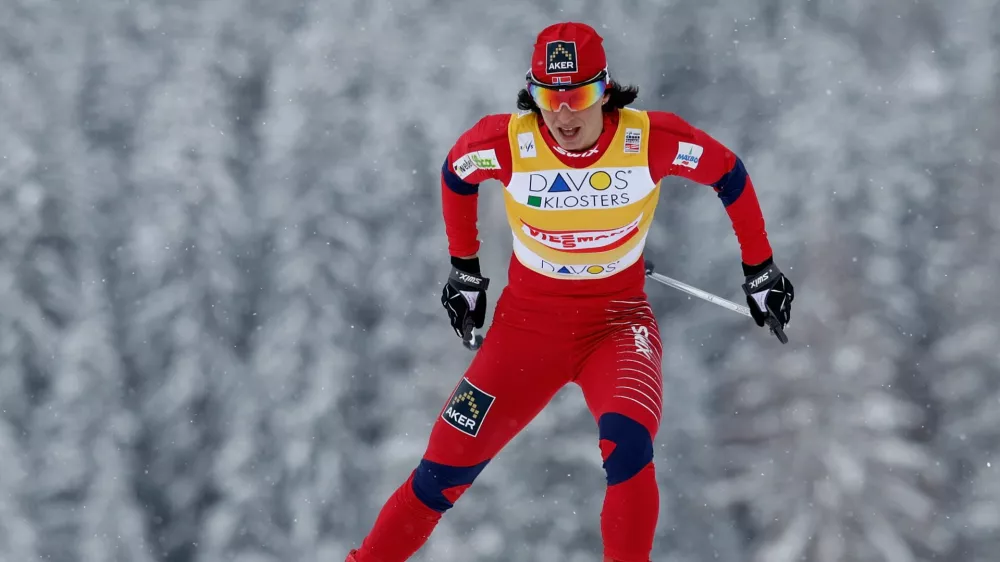 Marit Bjoergen from Norway competes during the women's 1,4 km cross country free sprint qualification of the FIS World Cup in Davos, Switzerland, Sunday, Dec. 12, 2010. (AP Photo/Keystone, Arno Balzarini)